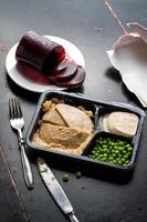 Turkey and stuffing TV dinner with canned cranberry photo