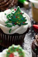 Christmas decorated cupcakes in chocolate and vanilla photo