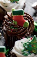 Christmas decorated cupcakes in chocolate and vanilla photo