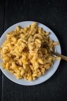 macaroni and cheese noodles in dish flat lay photo