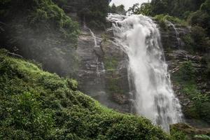 Wachirathan waterfalls is the second major waterfall on the way up Doi Inthanon national park This one is an impressive and powerful waterfall of Chiang Mai province of Thailand. photo