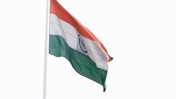 India flag flying high at Connaught Place with pride in blue sky, India flag fluttering, Indian Flag on Independence Day and Republic Day of India, tilt up shot, Waving Indian flag, Har Ghar Tiranga video