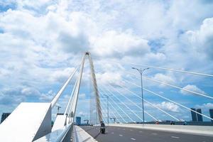 Ho Chi Minh city, Vietnam - MAY 22 2022 Thu Thiem 2 bridge, connecting Thu Thiem peninsula and District 1 across the Saigon River in Bach Dang port photo