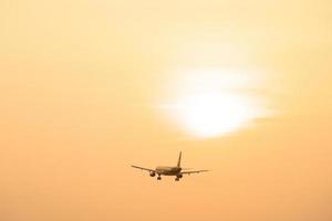 Ho Chi Minh city, Vietnam - FEB 20 2022 Airplane fly over urban areas preparing landing into Tan Son Nhat International Airport and takes off in TSN airport photo