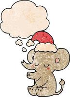 lindo elefante de navidad y burbuja de pensamiento en estilo de patrón de textura grunge vector