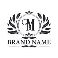 diseño de logotipo de letra m dorada de lujo vintage. vector
