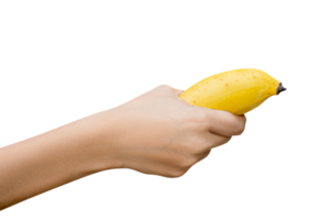 mão feminina segurando firmemente uma banana isolada em branco,