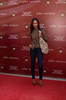 los angeles, 13 de marzo - zoe saldana llegando al octavo beneficio anual de stuart house de john varvatos en la tienda john varvaots el 13 de marzo de 2011 en los angeles, ca foto