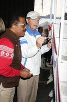 LOS ANGELES, DEC 30 - Ted Lange, Bernie Kopell at the Original Love Boat Cast decorates Princess Cruises Rose Parade Float at a Rosemont Pavilion on December 30, 2014 in Pasadena, CA photo