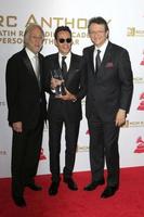 LAS VEGAS, NOV 16 - Neil Portnow, Marc Anthony, Gabriel Arbaroa at the 2016 Latin Recording Academy Person of the Year at MGM Grand Garden Arena on November 16, 2016 in Las Vegas, NV photo