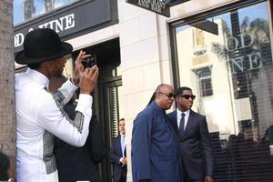 LOS ANGELES, OCT 10 - Usher, Stevie Wonder, Kenny Babyface Edmonds at the Kenny Babyface Edmonds Hollywood Walk of Fame Star Ceremony at Hollywood Boulevard on October 10, 2013 in Los Angeles, CA photo