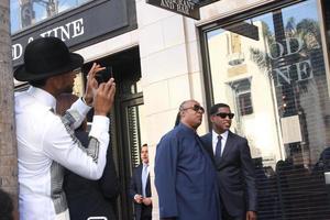 LOS ANGELES, OCT 10 - Usher, Stevie Wonder, Kenny Babyface Edmonds at the Kenny Babyface Edmonds Hollywood Walk of Fame Star Ceremony at Hollywood Boulevard on October 10, 2013 in Los Angeles, CA photo