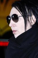 LOS ANGELES, OCT 10 - Marilyn Manson arriving at the Premiere of Universal Pictures  The Thing at the Universal Studios Hollywood on October 10, 2011 in Los Angeles, CA photo