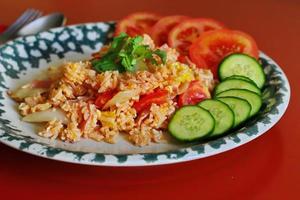 Ham fried rice with onions, Asian style fried rice, street food fried rice available in Thailand. photo