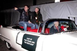 LOS ANGELES, DEC 1 - Tristan Rogers, Daniel Goddard at the 2013 Hollywood Christmas Parade at Hollywood and Highland on December 1, 2013 in Los Angeles, CA photo