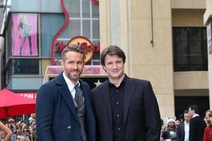 LOS ANGELES, DEC 15 - Ryan Reynolds, Nathan Fillion at the Ryan Reynolds Hollywood Walk of Fame at tbe Hollywood and Highland on December 15, 2016 in Los Angeles, CA photo