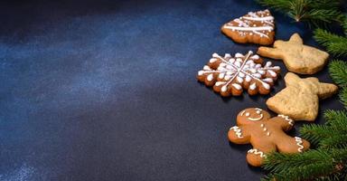 Delicious gingerbread cookies with honey, ginger and cinnamon. Christmas composition photo