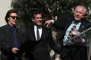 LOS ANGELES, FEB 9 - Paul McCartney, Eric Garcetti, Tom LeBonge at the Hollywood Walk of Fame Ceremony for Paul McCartney at Capital Records Building on February 9, 2012 in Los Angeles, CA photo