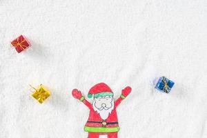 Top view of Santa Claus with gifts on white background. Christmas concept photo