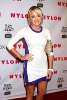 LOS ANGELES, APR 10 - Emily Osment arrives at the NYLON Magazine 13th Anniversary Celebration at Smashbox on April 10, 2012 in Los Angeles, CA photo