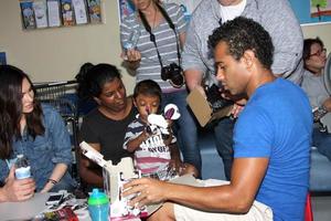 LOS ANGELES, SEP 16 - Megan Fox, Corbin Bleu at the Stars 4 Smiles, celebs visiting children at hospital at Harbor-UCLA Medical Center on September 16, 2014 in Torrance, CA photo