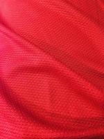 Traditional red cloth textile pattern with texture, beautiful, red background image. photo