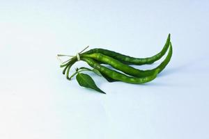 Bunch of green chilli photo