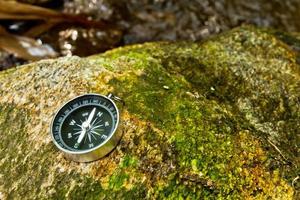 compass on the rock photo