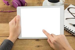 woman hands holding empty screen of tablet on wood desk work. photo