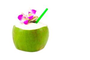 Green coconuts with drinking straw on white background photo