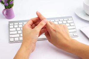 Young woman finger pain photo