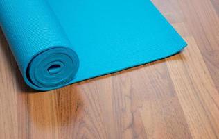 Blue yoga mat photo