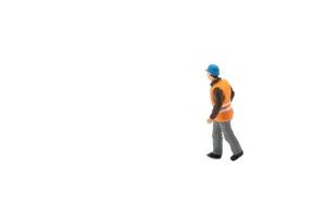 Miniature people engineer worker construction concept isolated on white background on white background photo