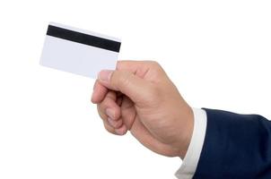 Business man handing a blank business card over white photo