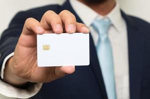 Man holding holding blank credit card photo