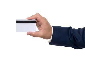 Business man handing a blank business card over white photo