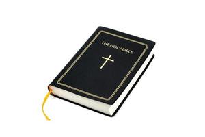 Holy Bible on white background photo