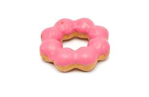 Pink donut on white background photo