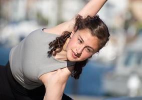 Female dancer close up outdoors with a blurred background photo