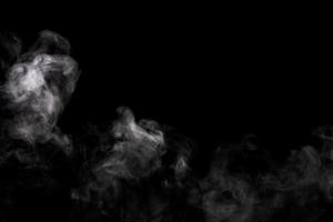 polvo abstracto o efecto de humo aislado en fondo negro, fuera de foco foto