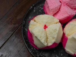 The Chinese fluffy rice flour cake on wood table for celebration day photo