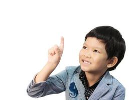 Asian boy is making expression isolated over white photo