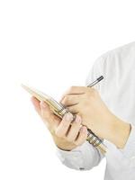 Man is taking note on small organized book isolated over white photo