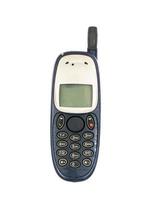 Old mobile phone on white background photo