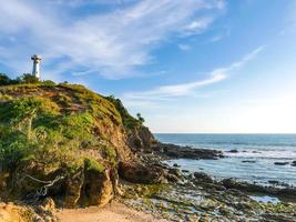 Seascape with the old lighthouse on the Koh Lanta island,Thailand photo