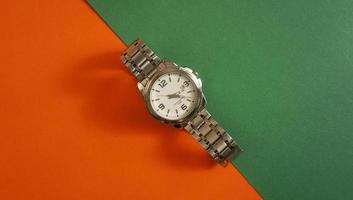 luxury watch isolated on a colored background photo