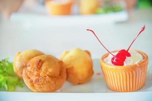 Colourful fried ice cream ball dish - fast delicious unhealthy food concept photo