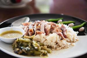 Rice with pork leg - famous traditional Thai recipe photo