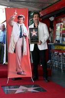 LOS ANGELES, JUL 25 - Joe Mantegna at the Peter Falk Posthumous Walk of Fame Star ceremony at the Hollywood Walk of Fame on July 25, 2013 in Los Angeles, CA photo