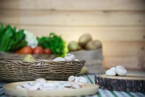 Fresh champignon mushroom vegetable in the kitchen - fresh mushroom vegetable cooking concept photo